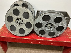 lot 16 image: Three Large Antique Movie Reels in Canister