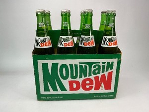 lot 17 image: Vintage Unopned 8 Pack of Mountain Dew Bottles