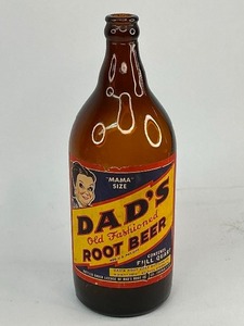 lot 57 image: Vintage Dads Old Fashioned Root Beer Mama Size Bottle - Paper Lable