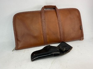 lot 83 image: Black Gun Holster and Black Sheep Gun Bag
