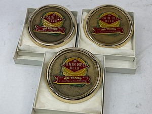 lot 111 image: Three 1893-1993 Grain Belt Beer Heavy Brass Coasters