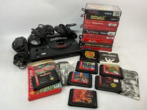 lot 134 image: Sega Genesis Game Console with Games