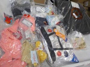 lot 233 image: New Childrens Clothes and Backpack...