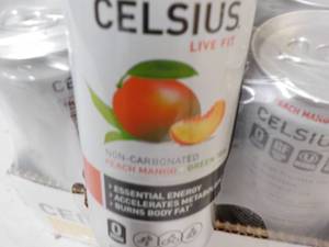 lot 254 image: 12 pack Celsius Non Carbonated Peac...