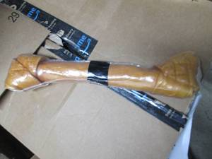 lot 192 image: big dog bone still wrapped...