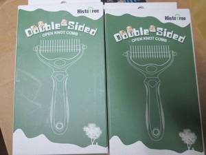 lot 196 image: 4 double sided open knot comb...