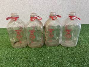 lot 76 image: Country Boy Dairy Glass Milk Jugs