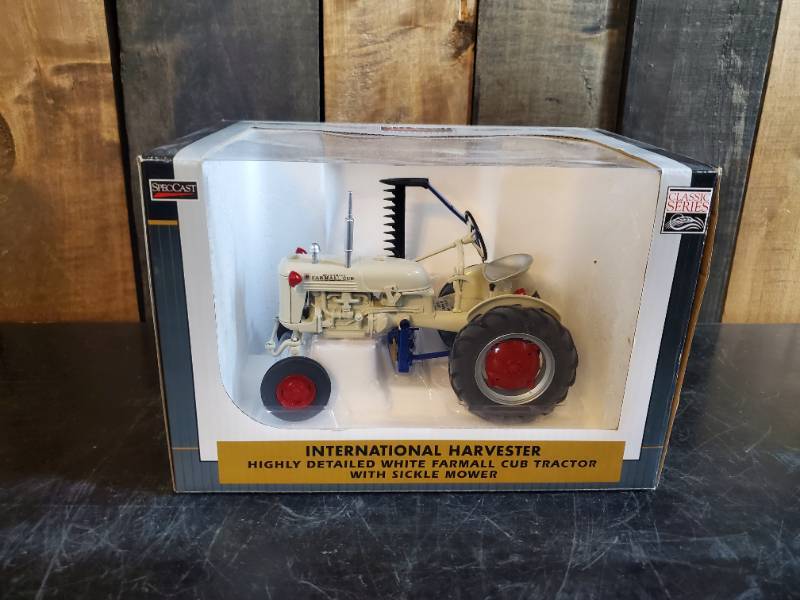 lot 67 image: International Harvester Tractor with Sickle Mower Still in Original Box