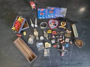 lot 10 image: Misc Lot of Smalls  Vintage Toy Top, Watches, Ragtime Harmonica, Mustang emblem and more