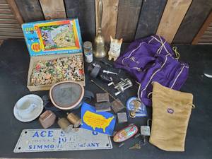 lot 24 image: Misc Lot of Various Items Crown Royal, Jaymar Walt Disney Puzzle, Lucky Metal Toy Car and more