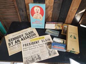 lot 31 image: Vintage Item Lot Assassination of Kennedy Paper, Vanta Baby Garments Box, Pinewood Guest Bar Box and more