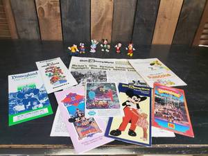 lot 58 image: Everything Disney  Great Vintage Brochures and Disney Paperwork with Collectable Disney Figures Mickey, Daisy Duck, Goofy and others