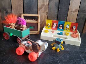 lot 78 image: Vintage Toys and Trolls,  Fisher Price Tape Player, Disney Pop up, Little Snoopy and More
