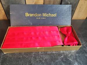 lot 80 image: Brandon Michael Cumberbun bright red never used just in time for Graduation