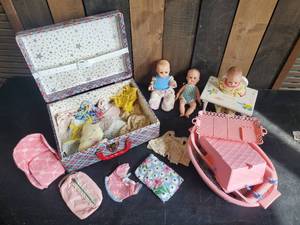 lot 87 image: Baby Dolls, Clothes, and Baby Suzy Goose Accessories Also a Vintage Case