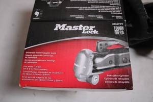 lot 78 image: Master Lock Universal Trailer Coupler Lock with Key