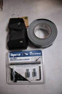 lot 85 image: Installation Kit with Drill Bits, Tool Holster, and All-Weather Duct Tape