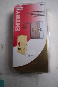 lot 176 image: Defender Security Solid Brass Lock & Door Reinforcer U-9550