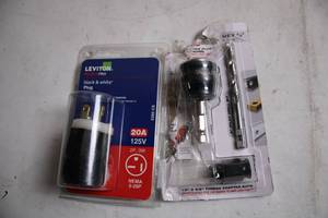 lot 216 image: Leviton Black & White Plug with Pilot Drill Bit