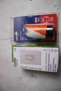 lot 228 image: Leviton 20A 125V Plug with Tork 125-277VAC In-Wall Springwound Timer
