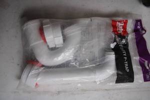 lot 245 image: 1 12 Plastic P-Trap Set for Plumbing