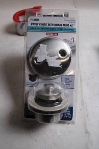 lot 260 image: Twist Close Bath Drain Trim Kit with Brushed Nickel Finish