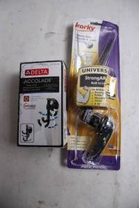 lot 333 image: Delta Accolade Toilet Paper Holder and Korky Universal StrongARM Handle
