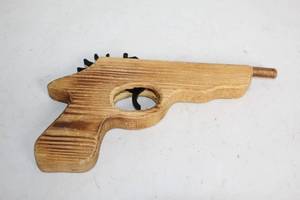 lot 23 image: Vintage Wooden Toy Gun with Moving Parts