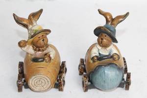 lot 35 image: Set of 2 Handcrafted Bunny Figurines in Decorative Cars