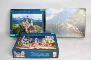 lot 182 image: Collection of 3 Open-Box 2000 Piece Jigsaw Puzzles
