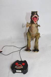 lot 397 image: Vintage The Lost World Jurassic Park Electronic Tyrannosaurus Rex Toy with Controller