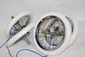 lot 440 image: Set of 4 Heavy-Duty Wheels with White Rims and Axles