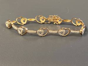 lot 145Z image: Elegant Gold Tone Sterling Silver 925 Heart Bracelet with Pav Stones