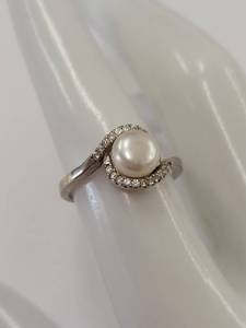 lot 13M image: Elegant White Pearl Ring with Sterling Silver Band and Gem Accents