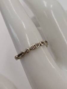 lot 150M image: Sterling Silver Ring with Elegant Bezels and Round Accents