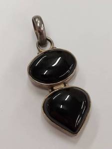 lot 192M image: Elegant Sterling Silver Pendant with Black Stones
