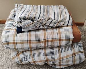 lot 31 image: Two Twin Size Comforters and One Set of Twin Size Sheets