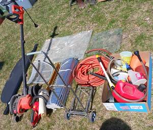 lot 3 image: YardGarage Lot Black and Decker Corded Edger, Air Hose, funnels, Hedge Trimmer