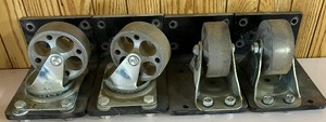 lot 49 image: Four 4 Cast Iron Industrial Wheels