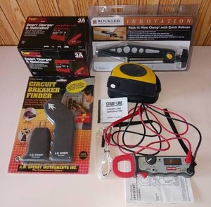 lot 50 image: Tool LOT - Craftsman DCAC Clamp Meter, Everstart 3A Smart Charger, Pocket Hole Clamp, Straight Line Generator, Circuit Breaker Finder