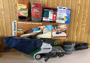 lot 102 image: Sanders - Hitachi Belt Sander, Porter Cable Palm Sander and Sandpaper