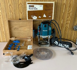 lot 104 image: Makita RP2301FC Plunge Router with Bits