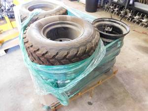 lot 20 image: 4 - Firestone Turf and Field Rims and Tires