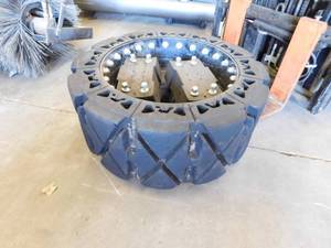 lot 33B image: Evolution Skid Steer Tires  Wheels - 14 x 17.5