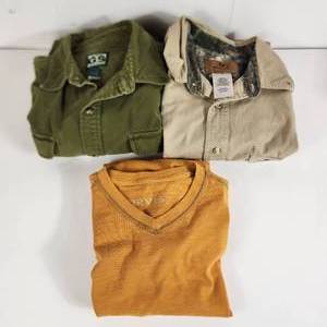 lot 45 image: Lot Of Three Mens Shirts Gander Mountain Long sleeve Green Size L Orvis Long Sleeve T-Shirt Size M And Mossy Oak Tan Short Sleeve Size XL
