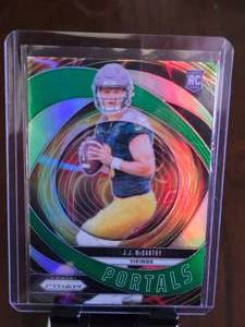 lot 76 image: JJ MCCARTHY 2024 PRIZM GREEN PORTALS ROOKIE CARD