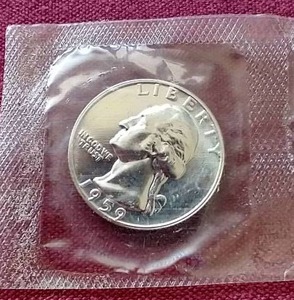 lot 46 image: 1959 Uncirculated Silver Quarter - Sealed