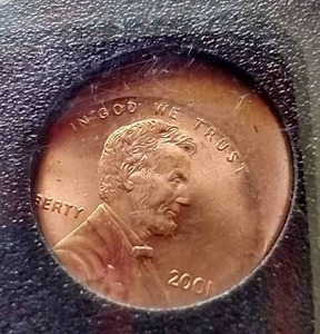 lot 54 image: Awesome 2001 Penny Off-Center Error Coin