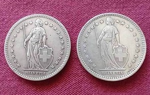 lot 69 image: (2) Switzerland Silver 2 Franc Coins