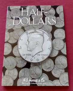 lot 98 image: Half Dollar Album With (2) 90% Silver Kennedy Halves